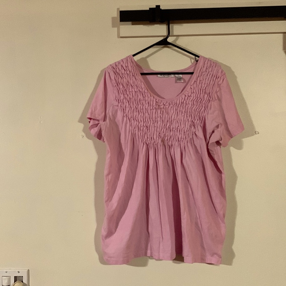 Woman’s pink top